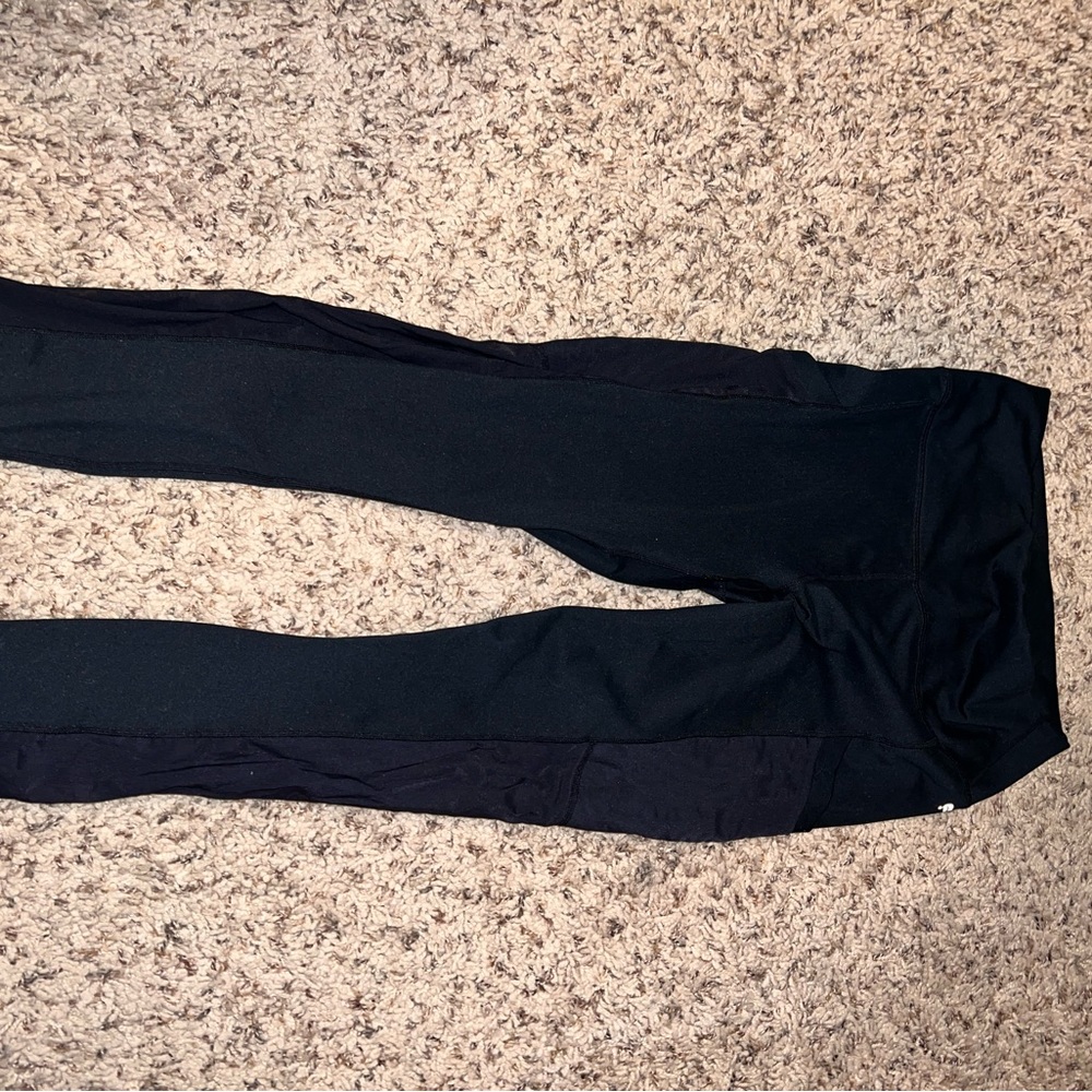 Black fabletics leggings with mesh and pockets